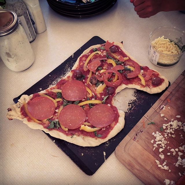 Home made pizza in the shape of the state of Minnesota